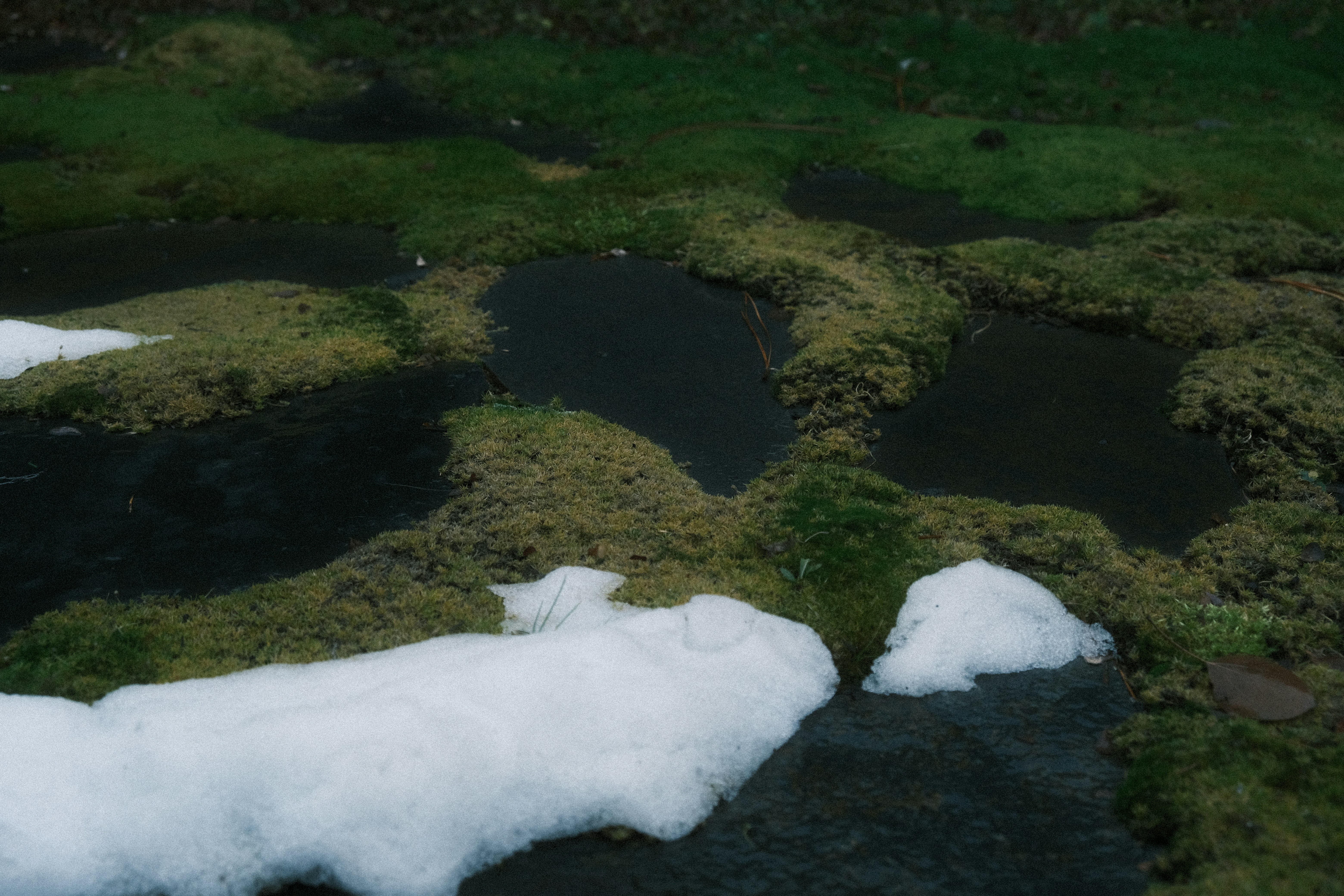 An aerial view of a snow covered area