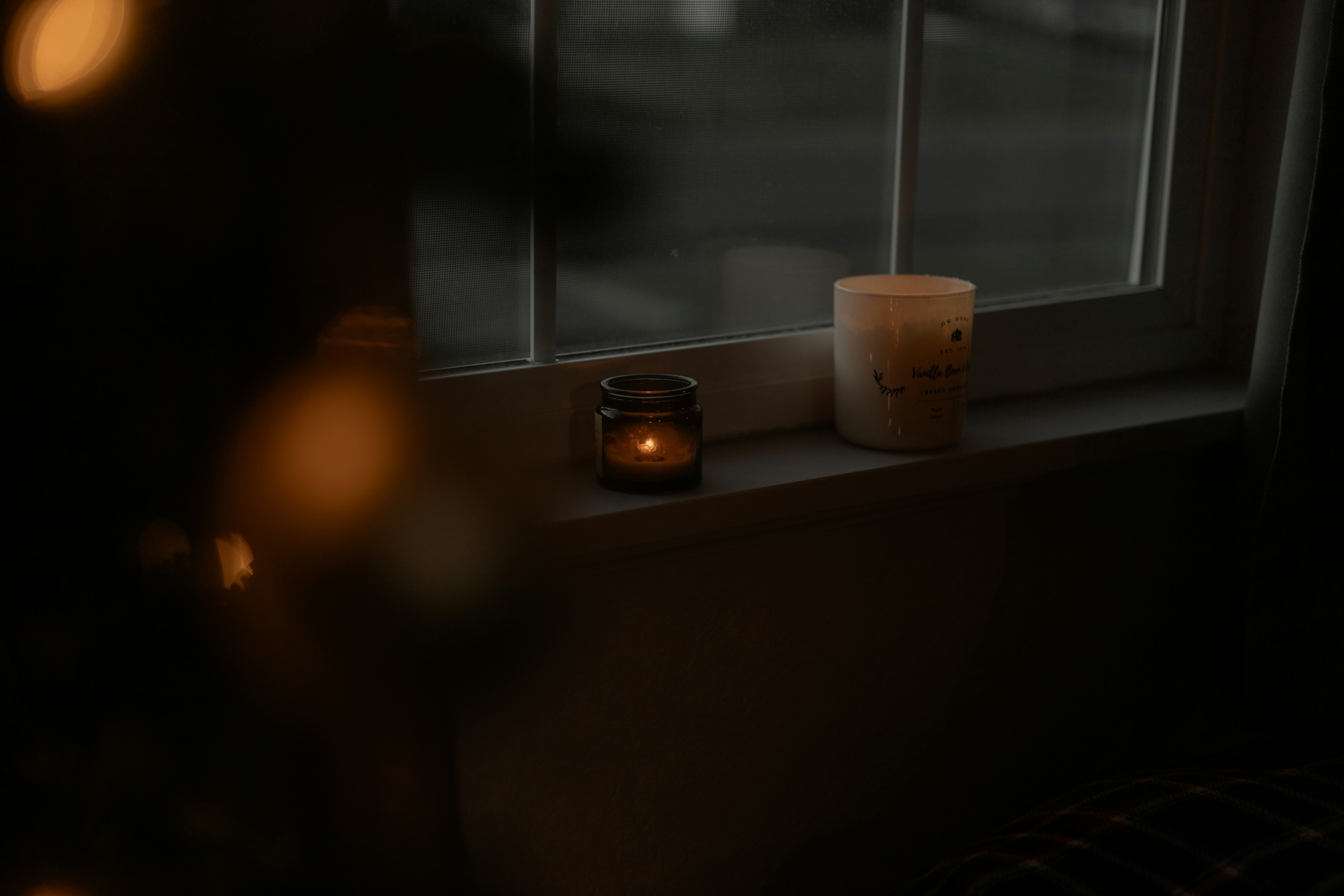 Candle on window sill