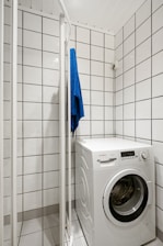 A washer and dryer in a small room
