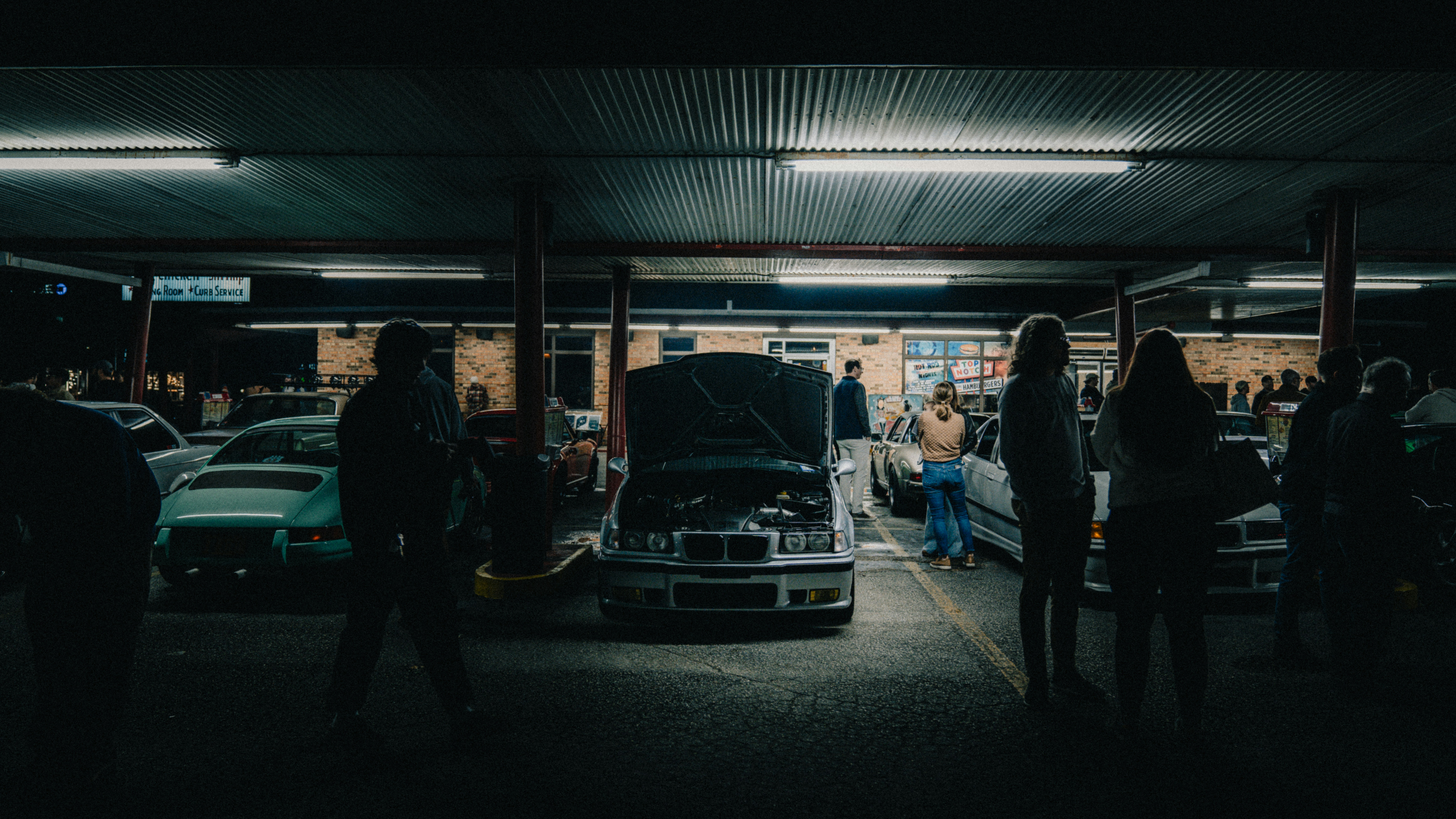 People in parking garage
