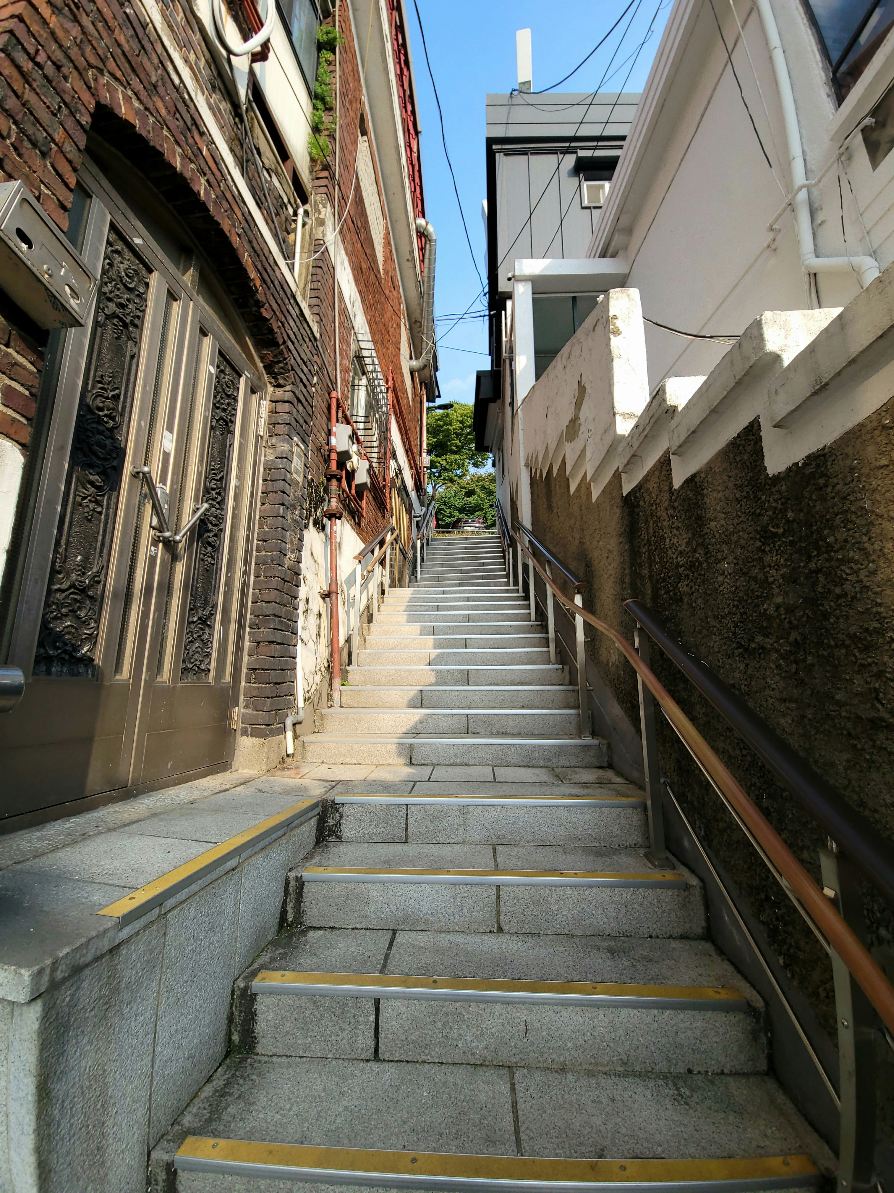 A set of stairs leading up to a building