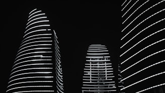 A black and white photo of a city at night