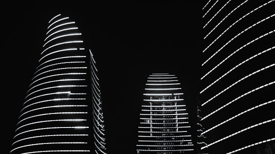 A black and white photo of a city at night