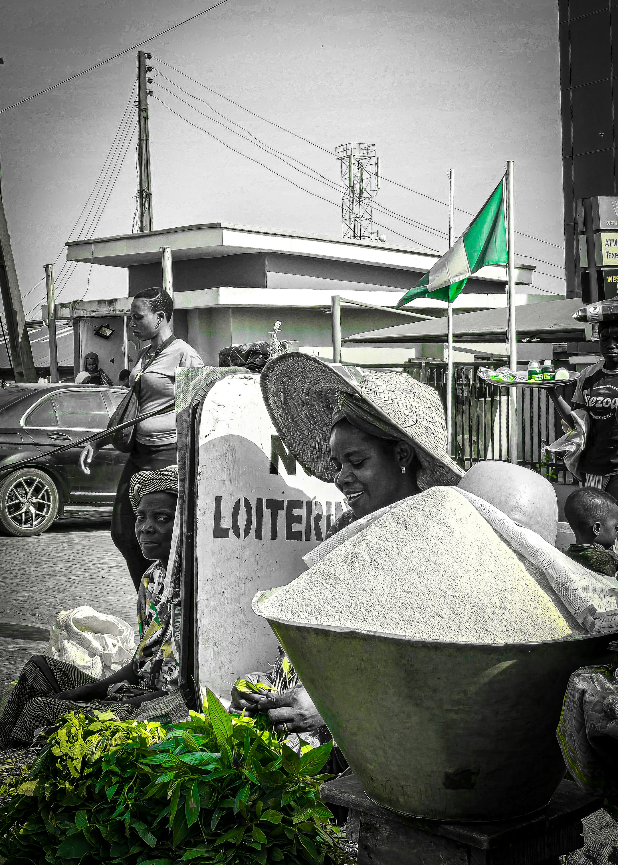A black and white photo of a woman with a hat