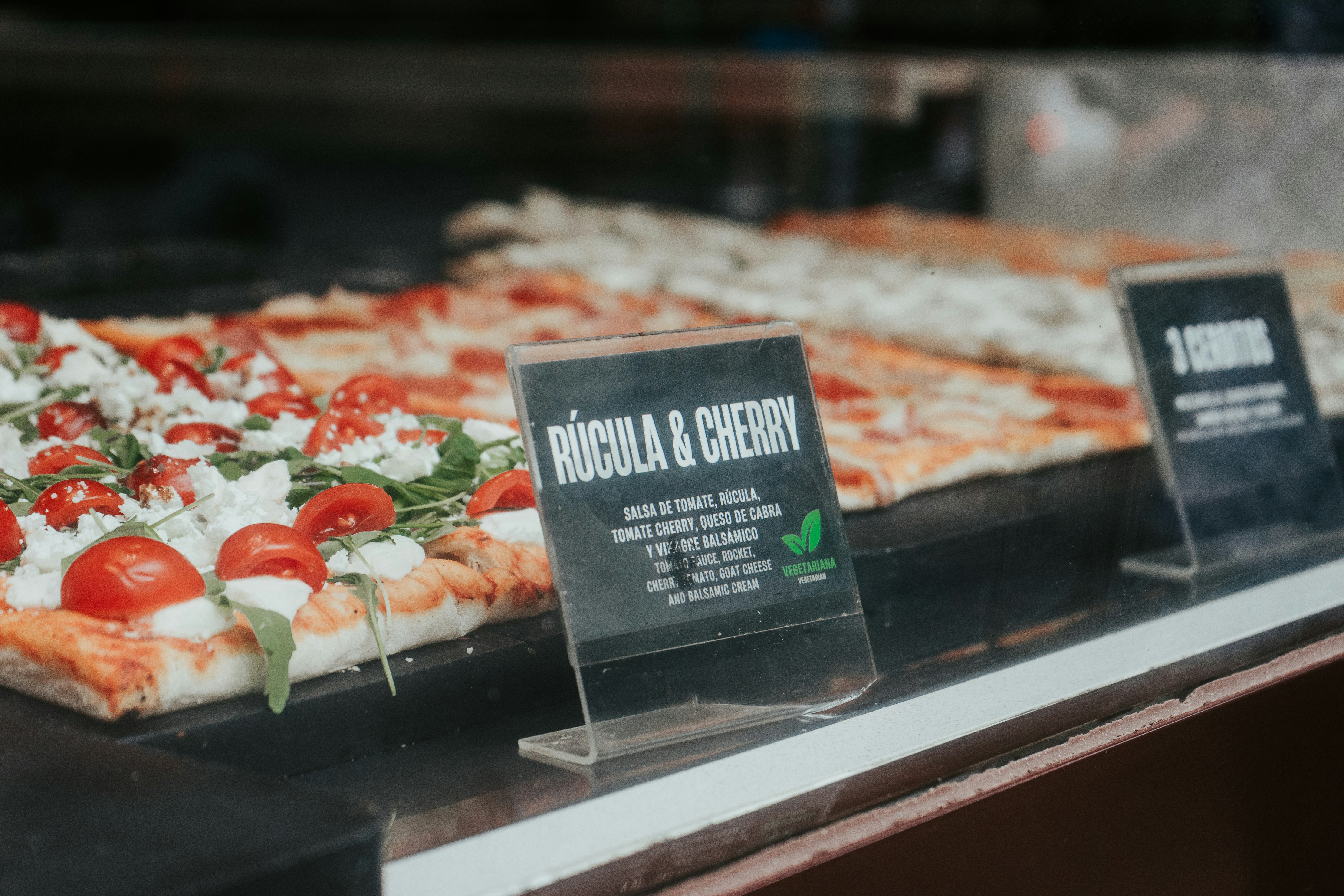 Close up of multiple types of pizza
