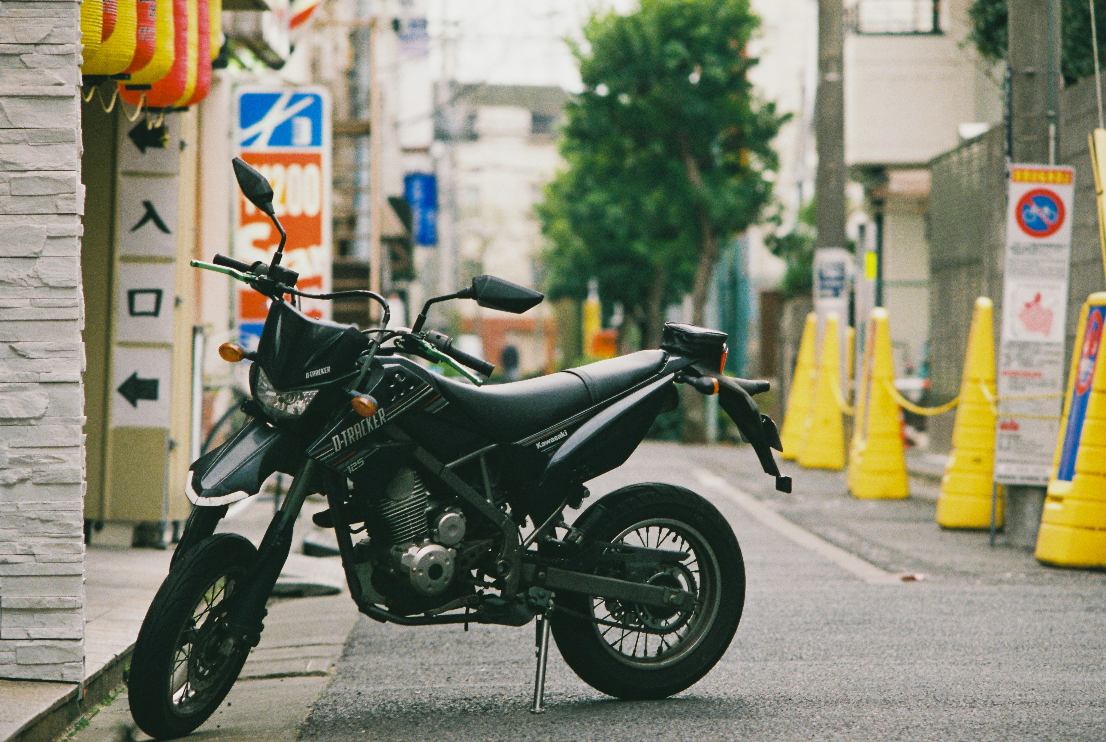 A motorcycle parked on the side of the road