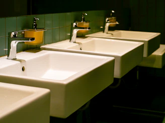 A row of sinks in a public restroom