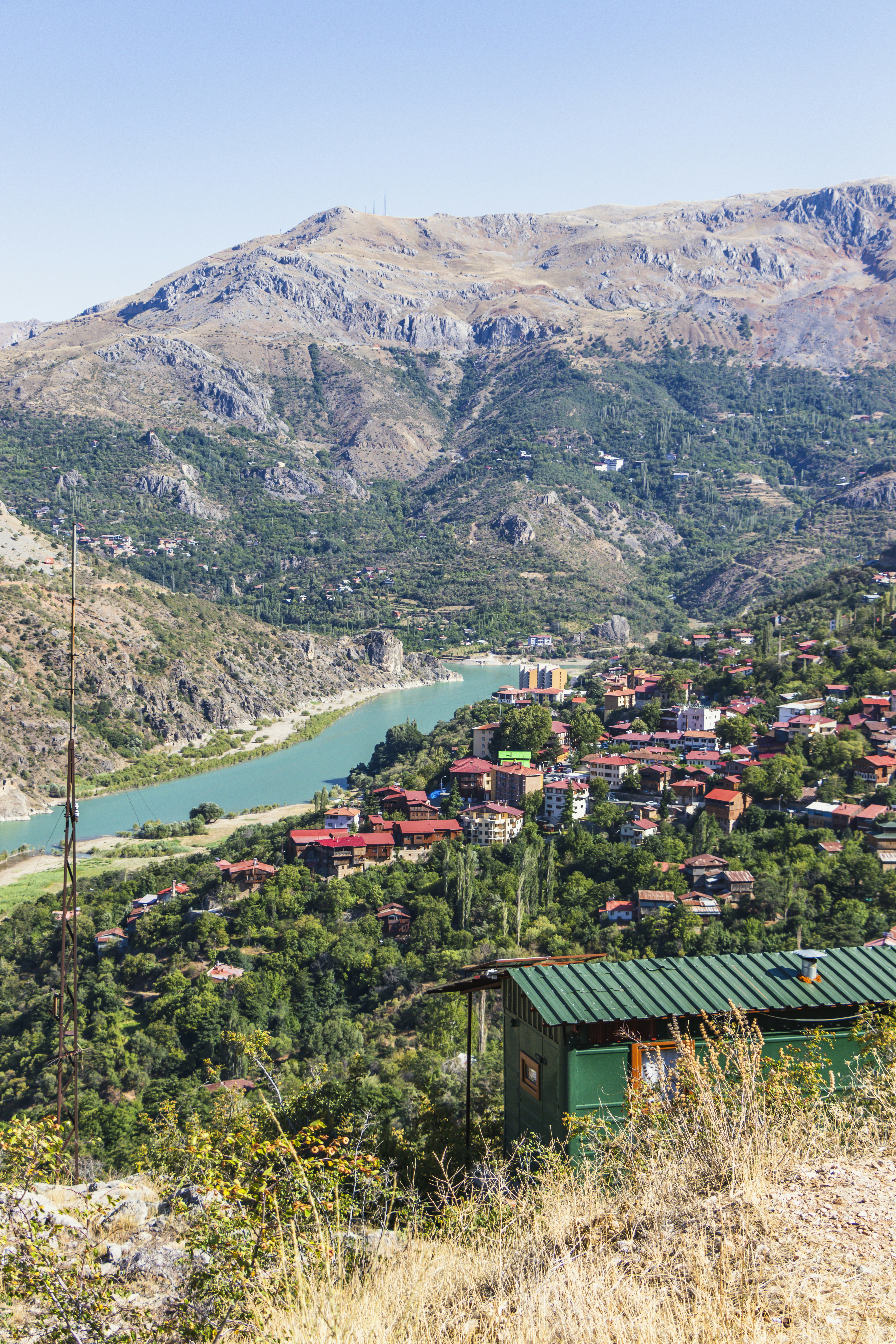 A scenic view of a small village in the mountains