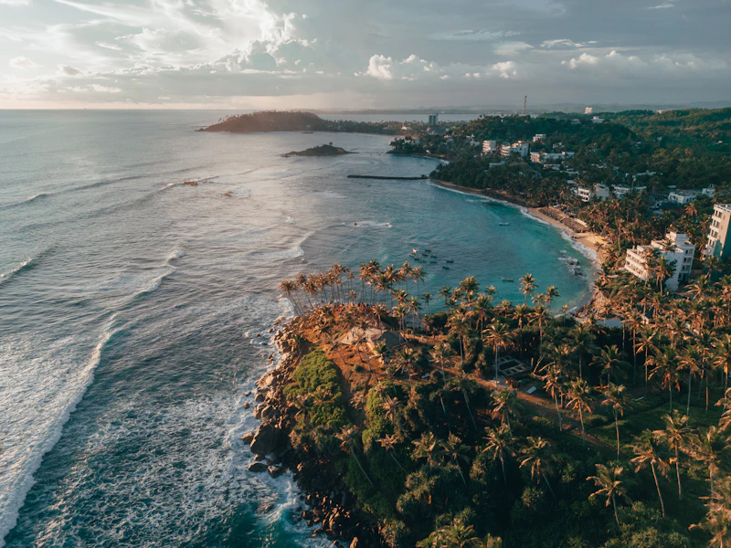 Aerial view of a tropical beach and clear blue sea