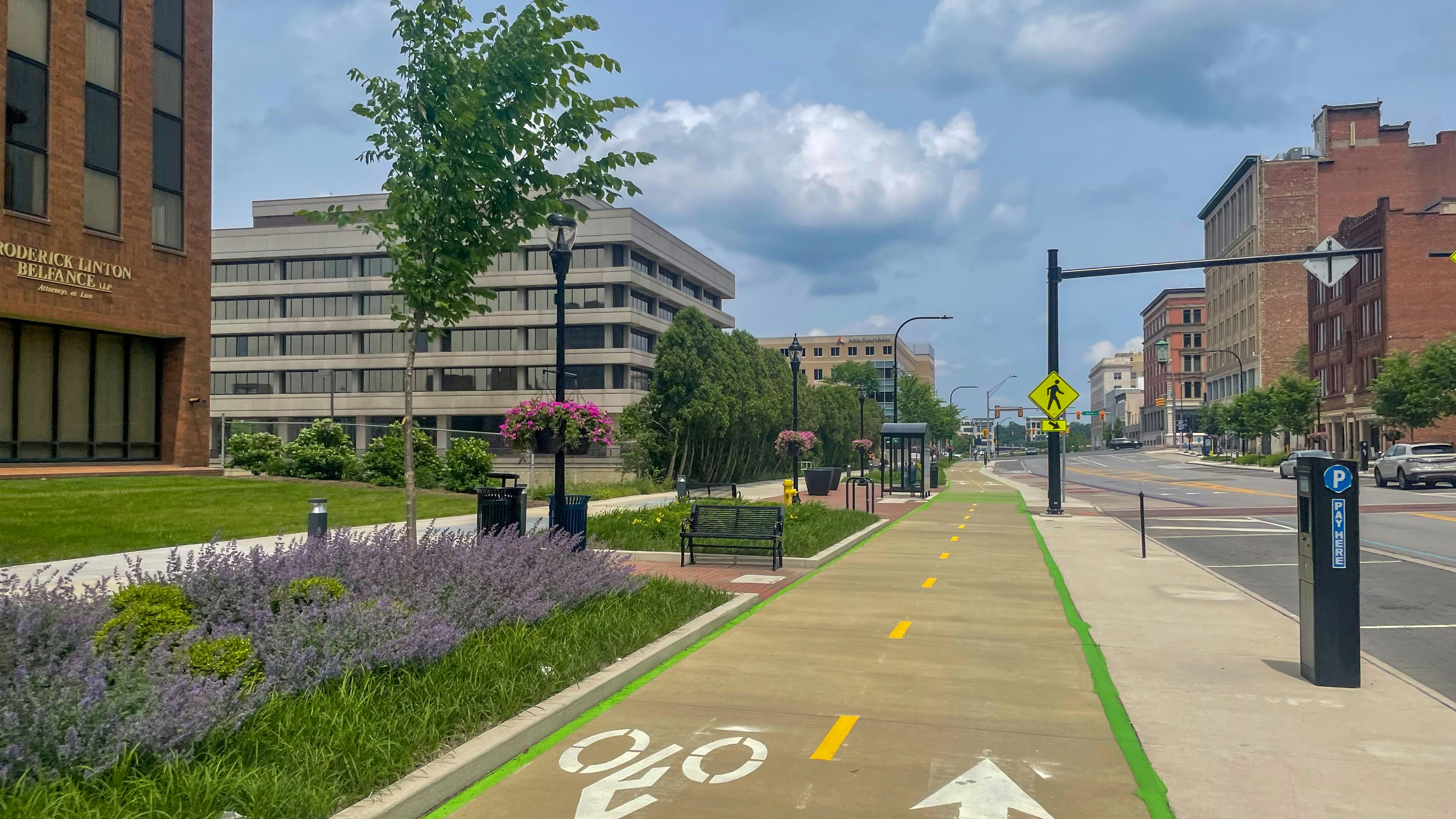 A bike path painted on the side of a street
