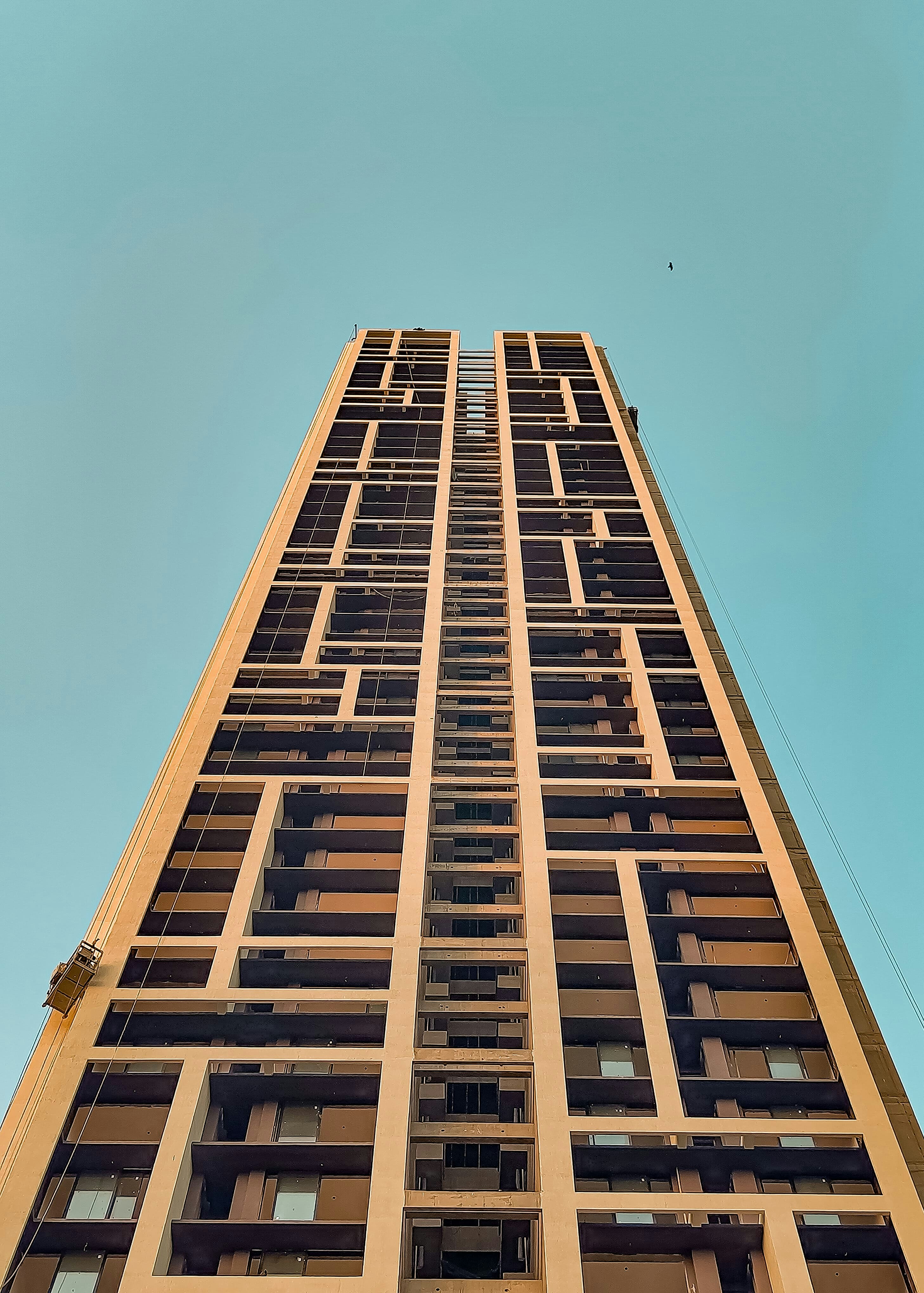 A tall building with a sky background