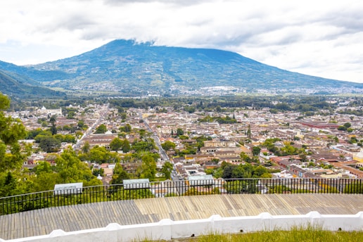 A view of a city with mountains in the background
