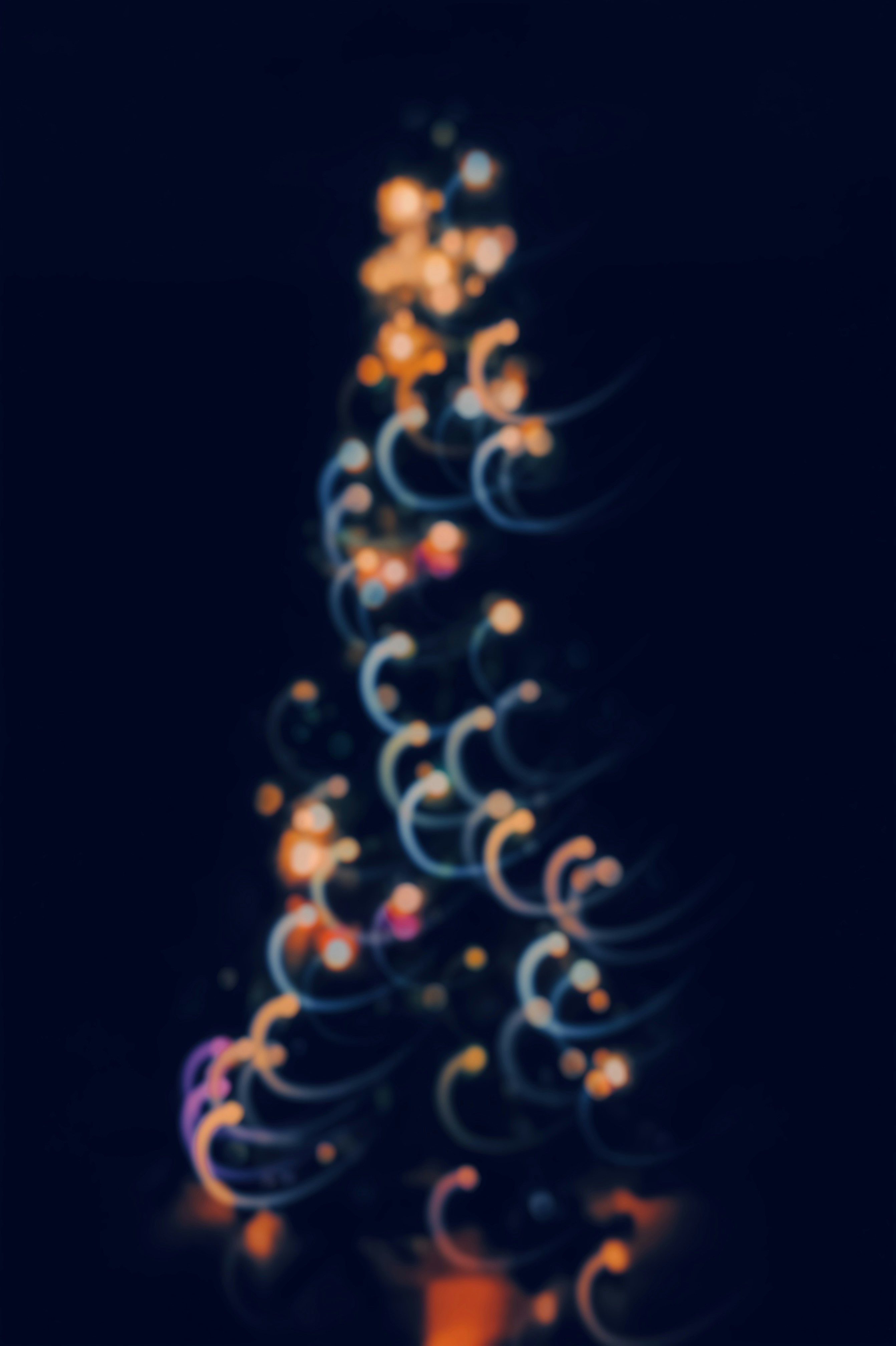 A blurry photo of a lit christmas tree