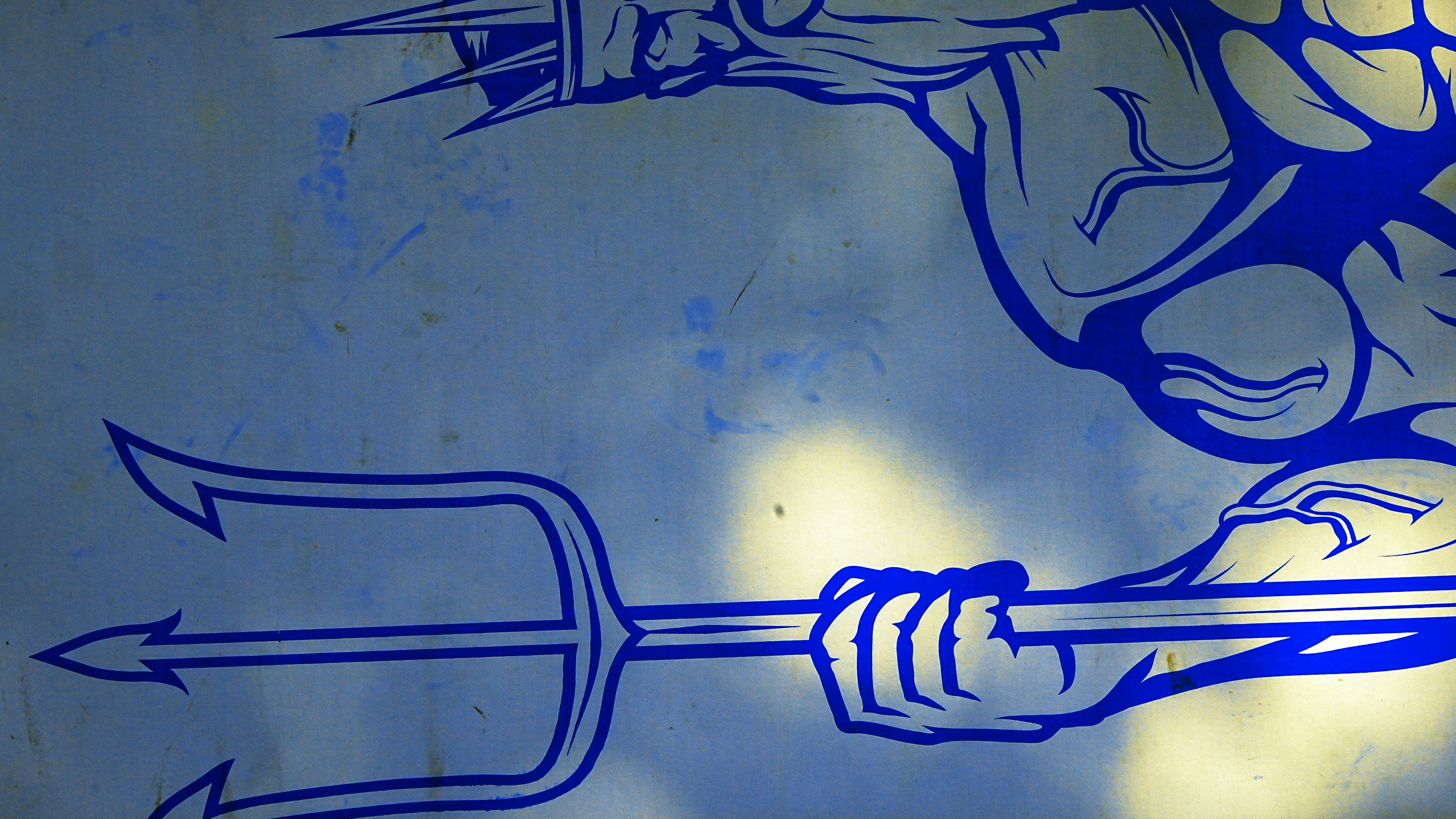 A drawing of a man holding a wrench