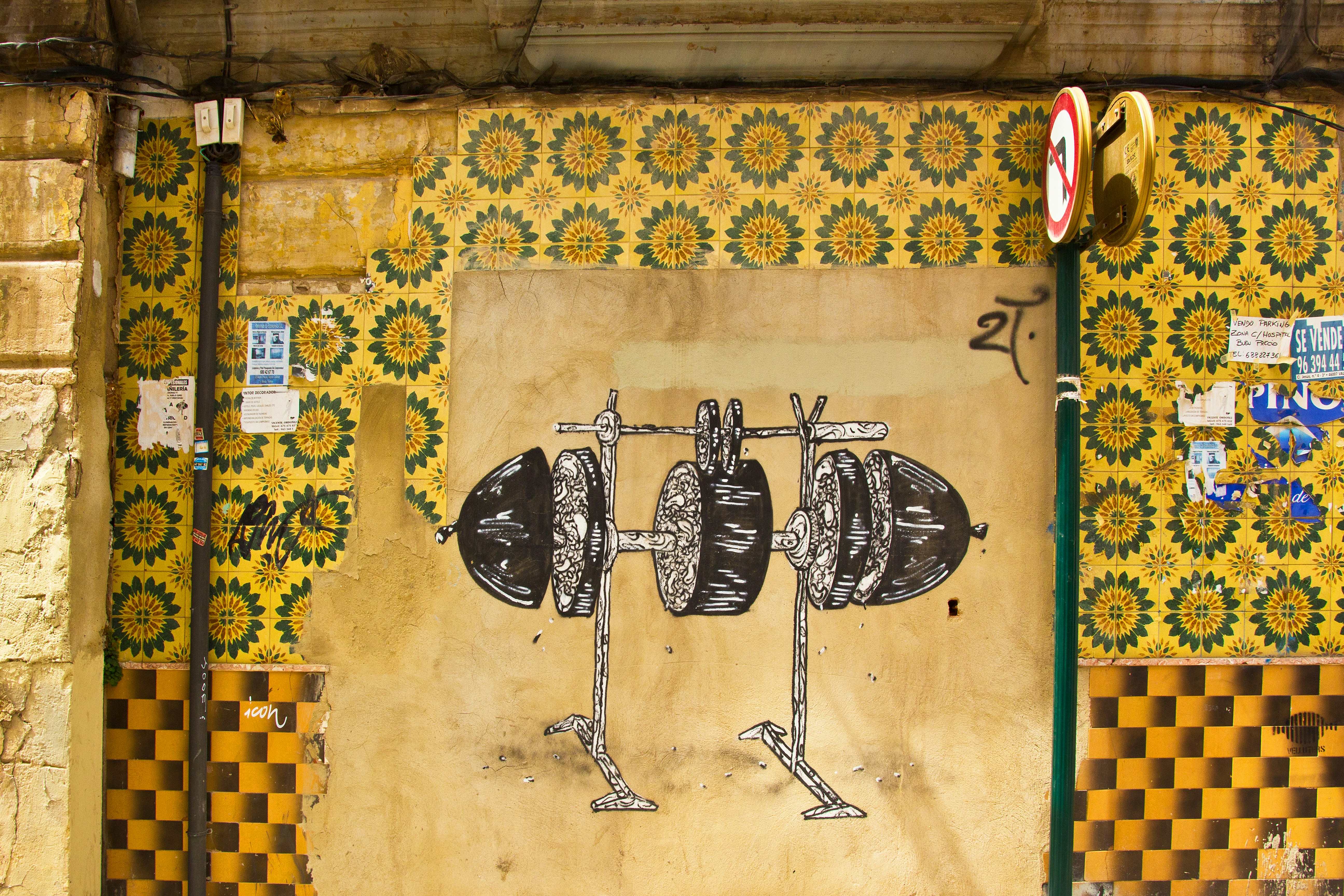 A painting of two skateboards on a wall