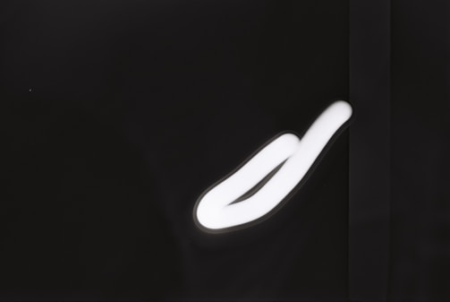 A black and white photo of a toothbrush