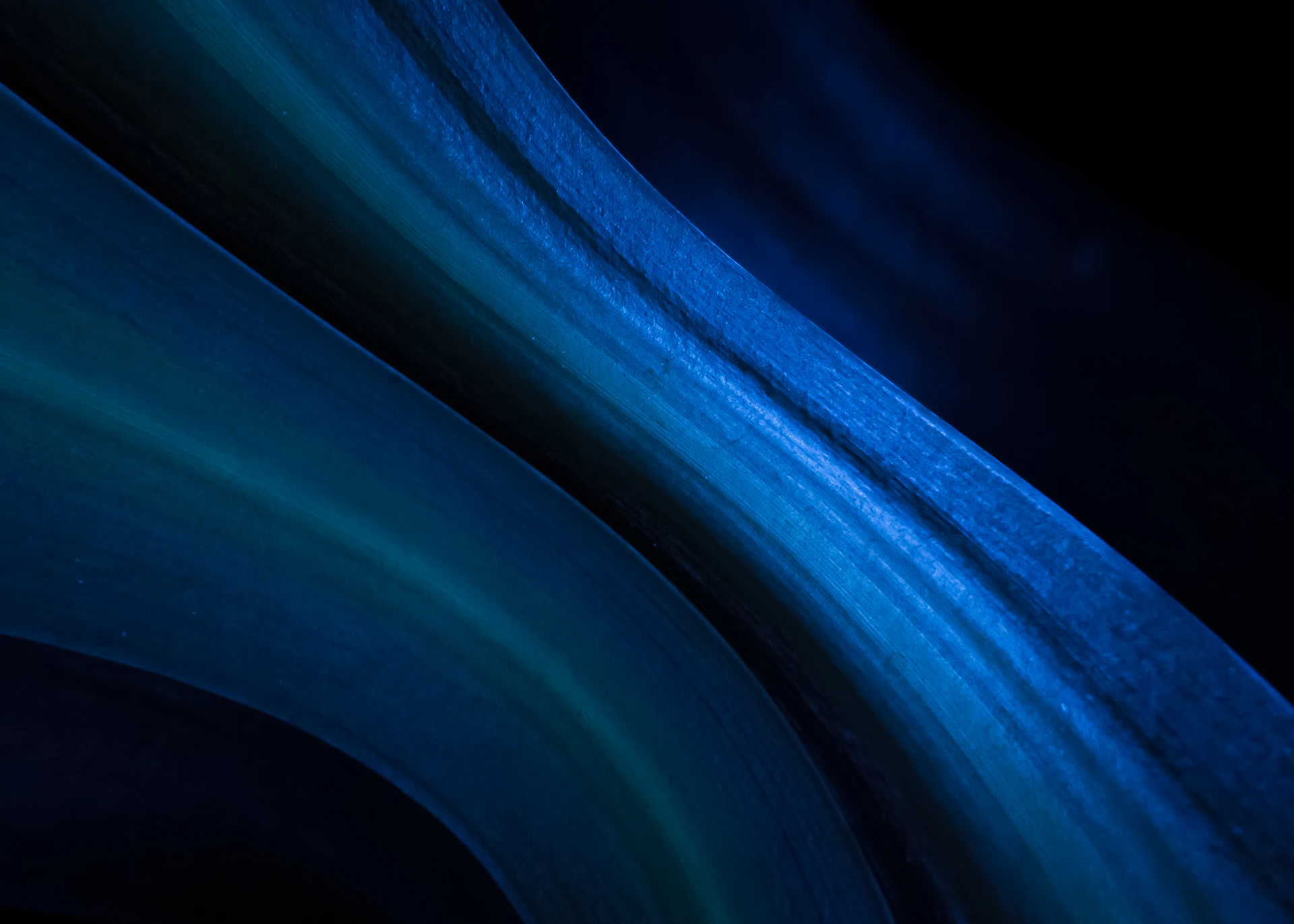 A cell phone with a blue and green design on it