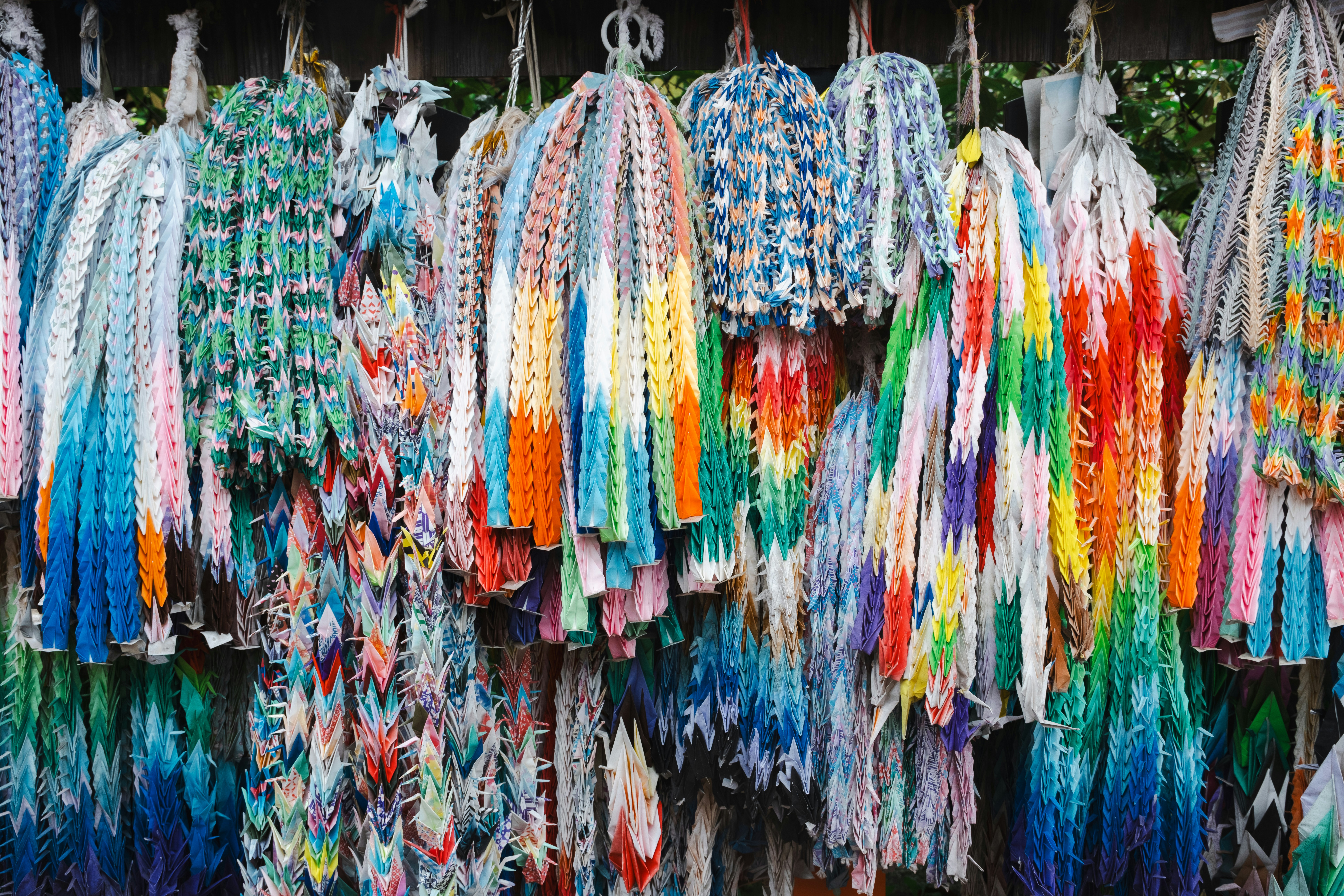 A bunch of ties are hanging on a rack