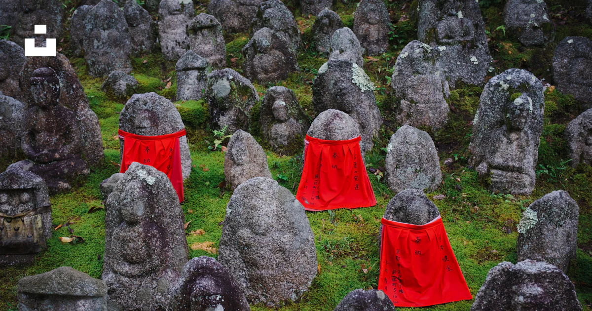 Japanese Red Rocks Real A large group of rocks with red cloths on them photo – Free Japan Image ...
