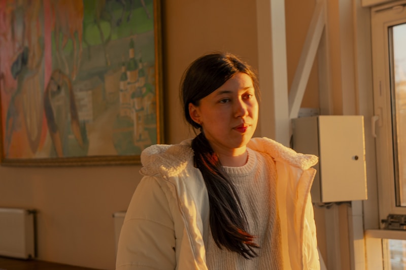 woman by window in modern interior