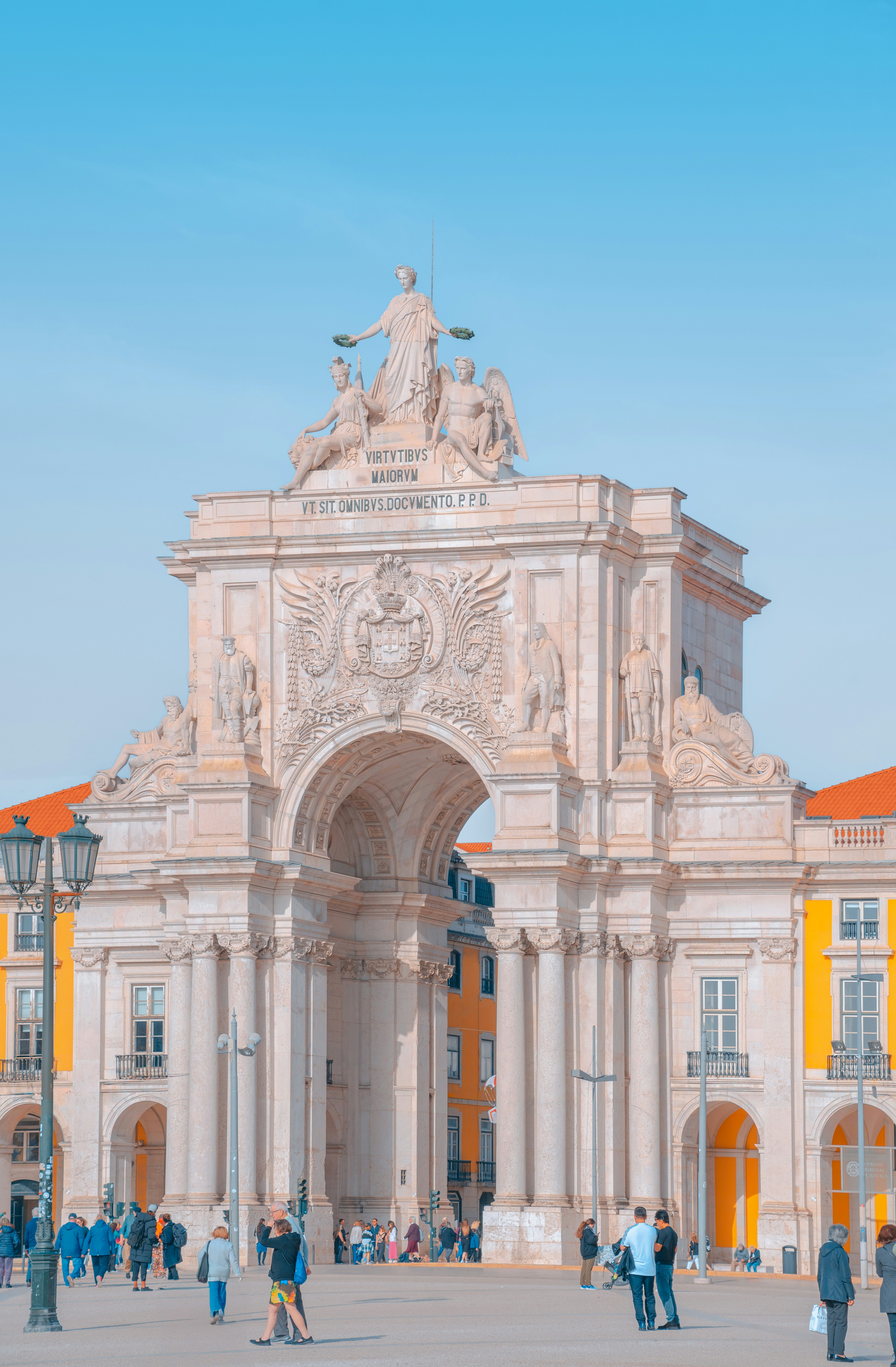 A group of people standing in front of a building