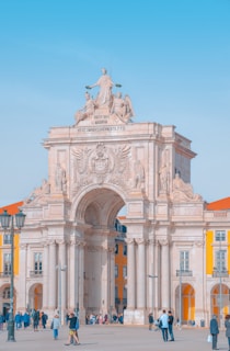 A group of people standing in front of a building