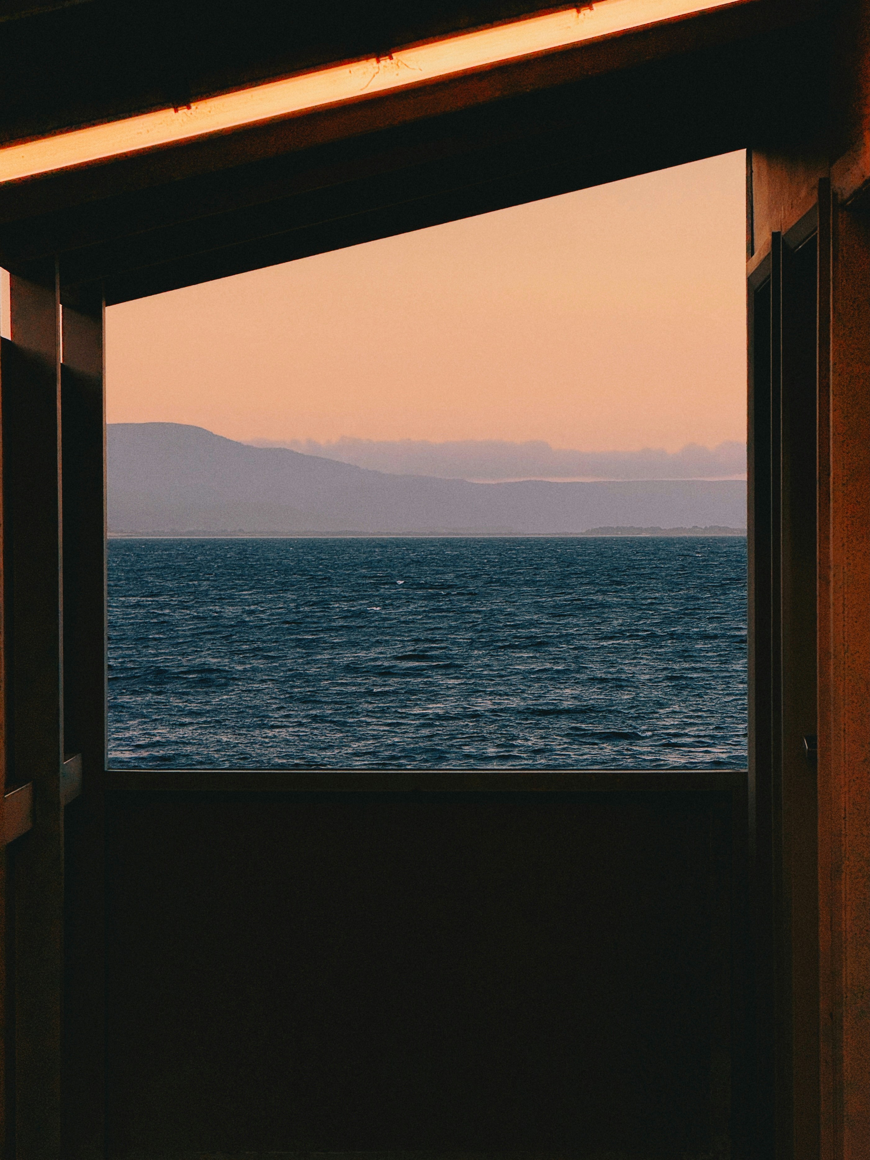 A view of a body of water through a window