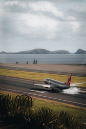 A large jetliner taking off from an airport runway