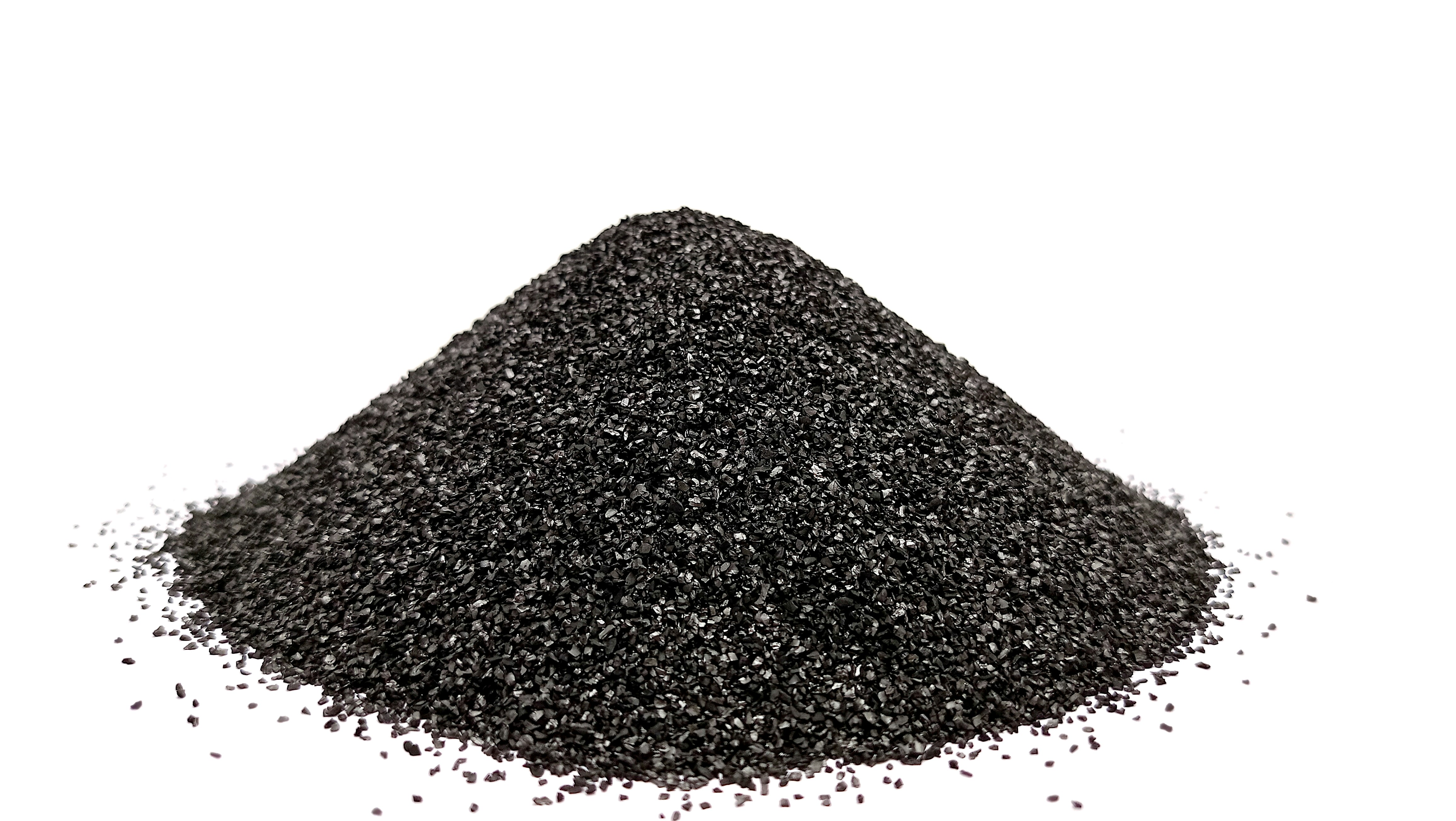 A pile of black sand on a white background
