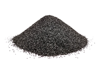 A pile of black sand on a white background