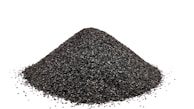 A pile of black sand on a white background