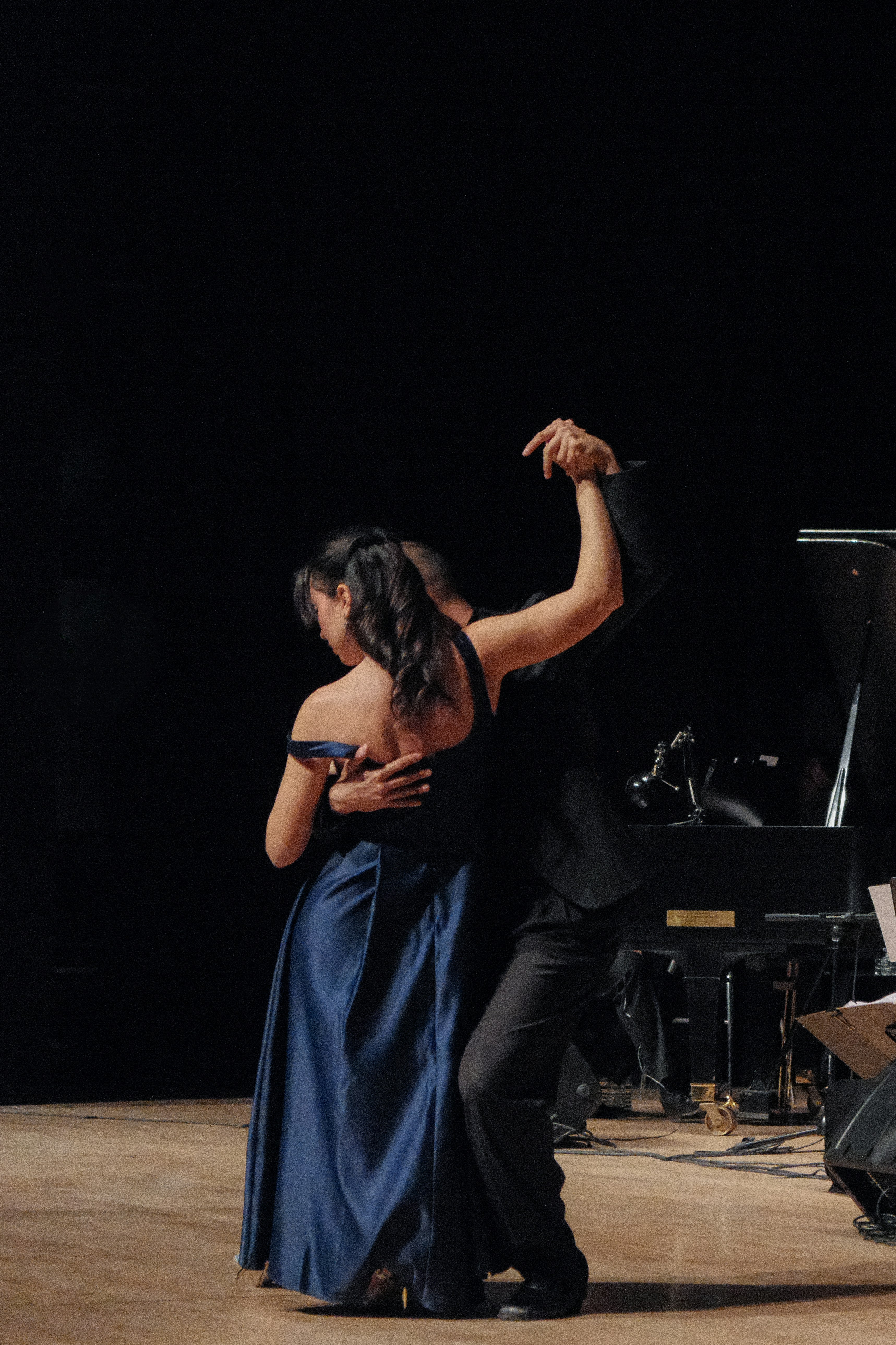 A couple of people that are on a stage