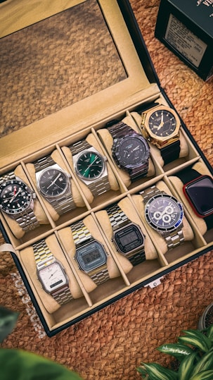 A box of watches sitting on top of a table
