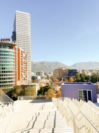 A view of a city from the top of a building