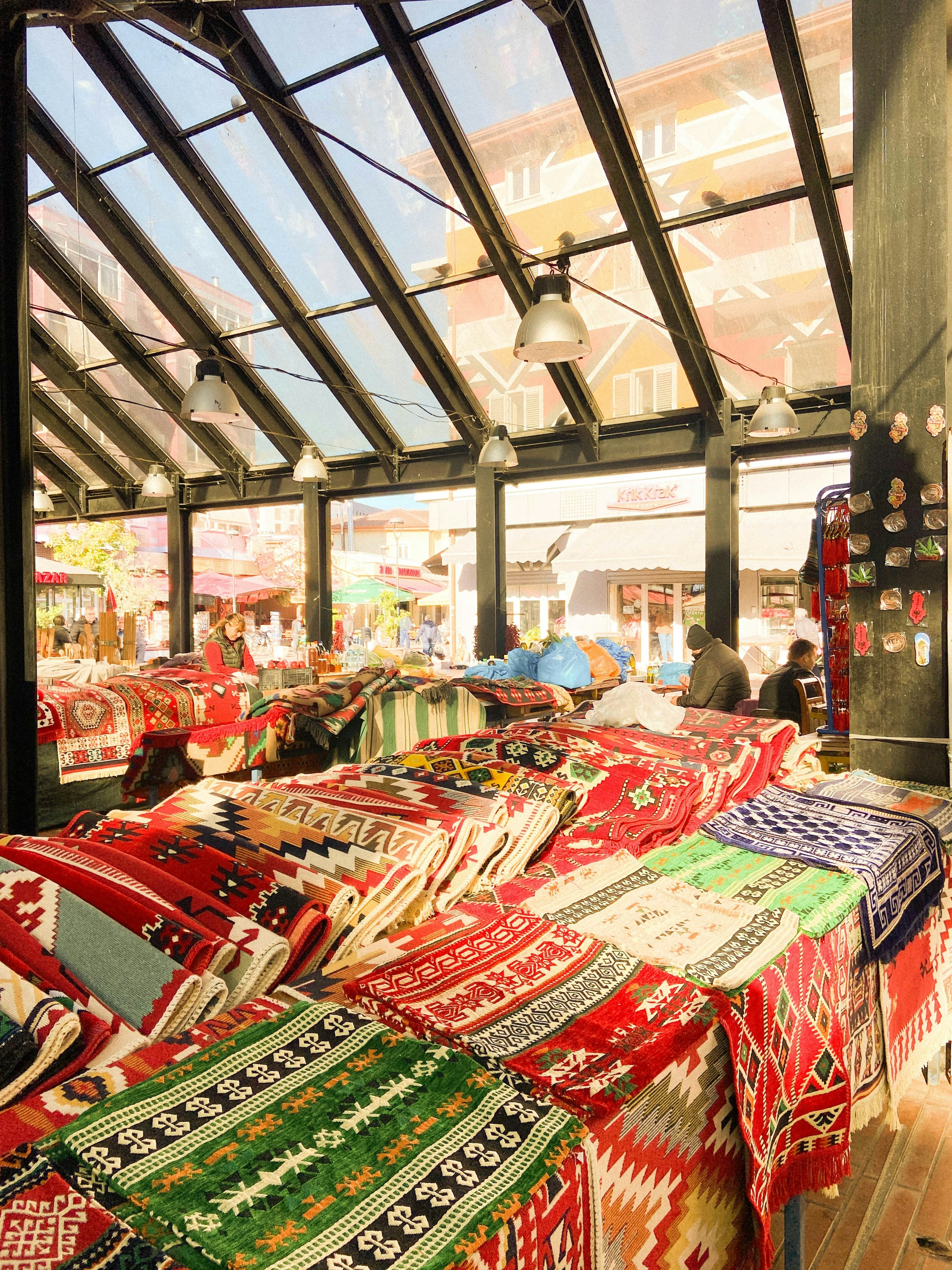 A room filled with lots of colorful blankets