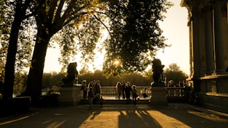 A group of people sitting on a park bench