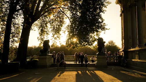 A group of people sitting on a park bench