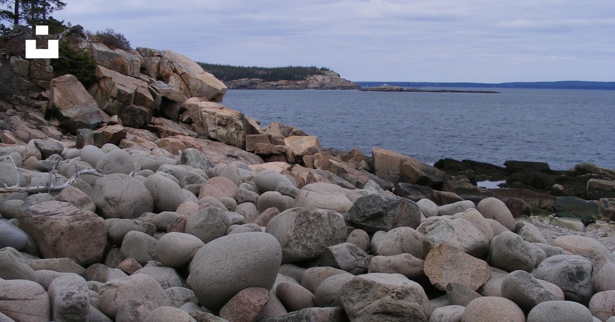 A bunch of rocks that are by the water photo – Free Bingham Image on ...