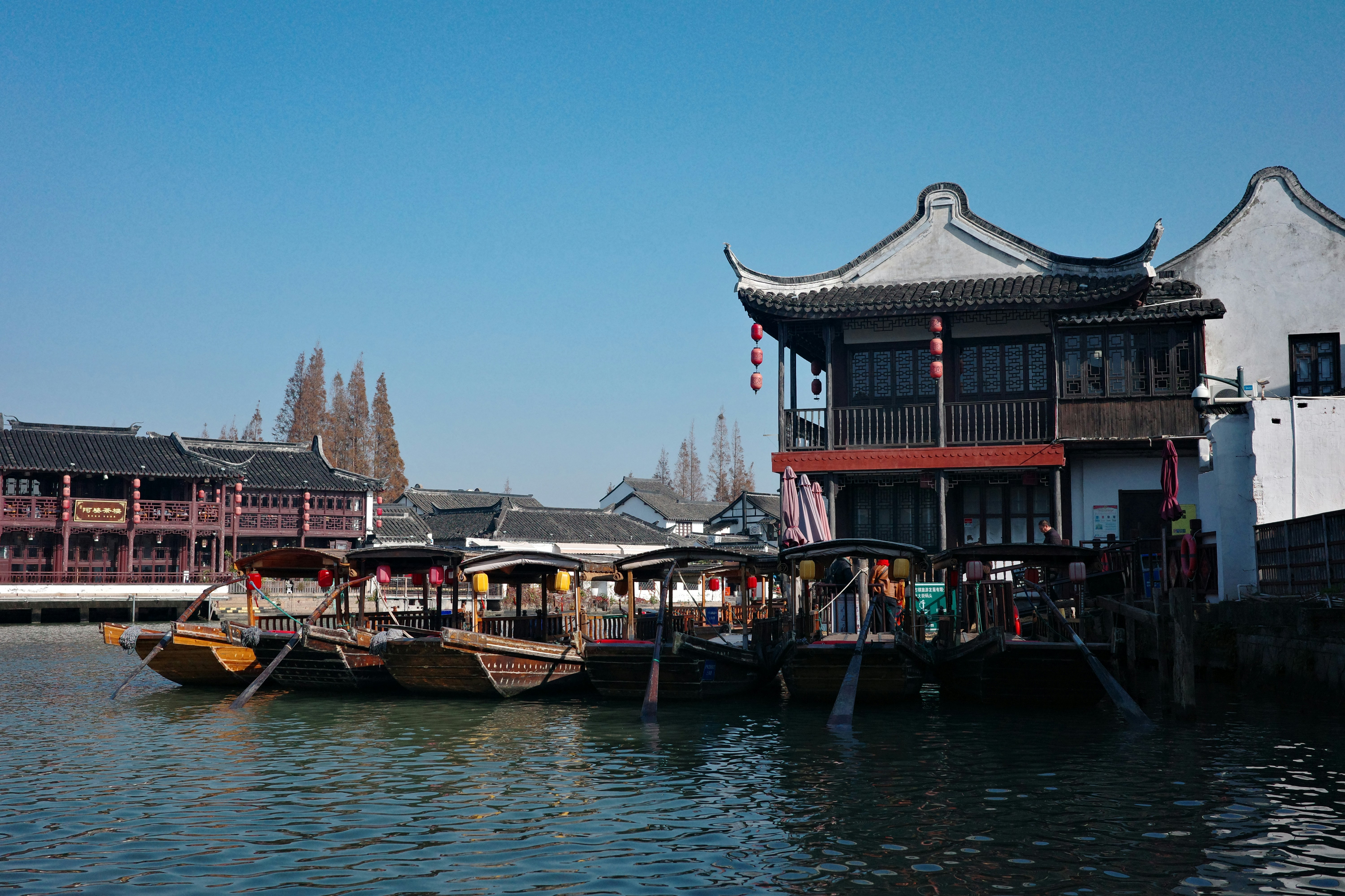 A body of water filled with lots of boats