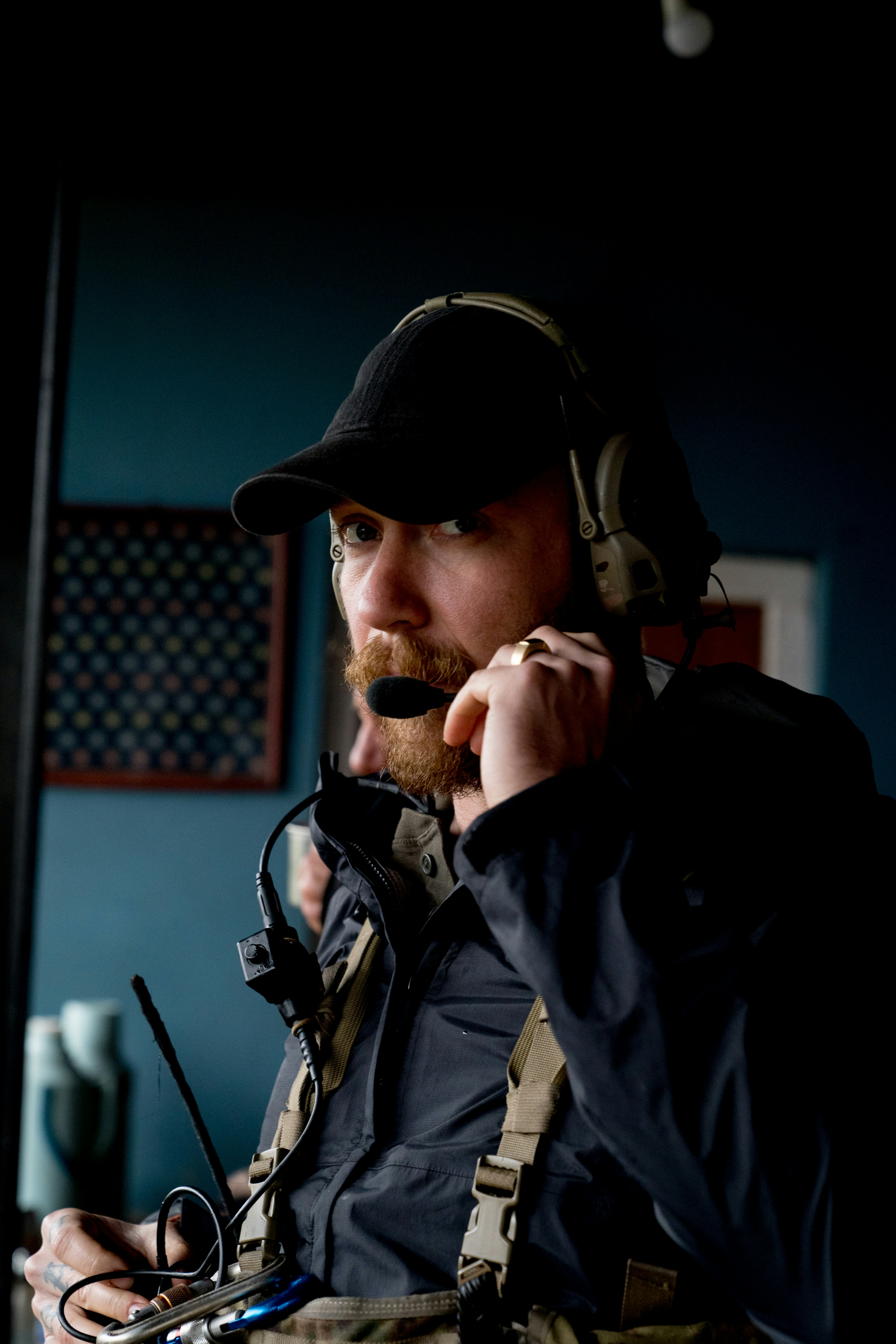 A man sitting in a chair with headphones on