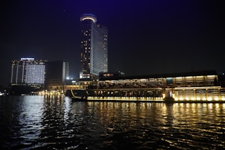 A large body of water with a city in the background
