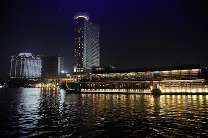 A large body of water with a city in the background