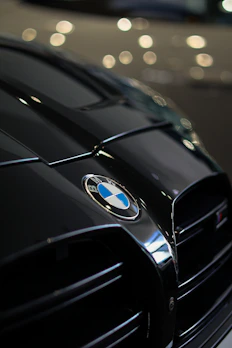 A close up of a BMW car on a city street
