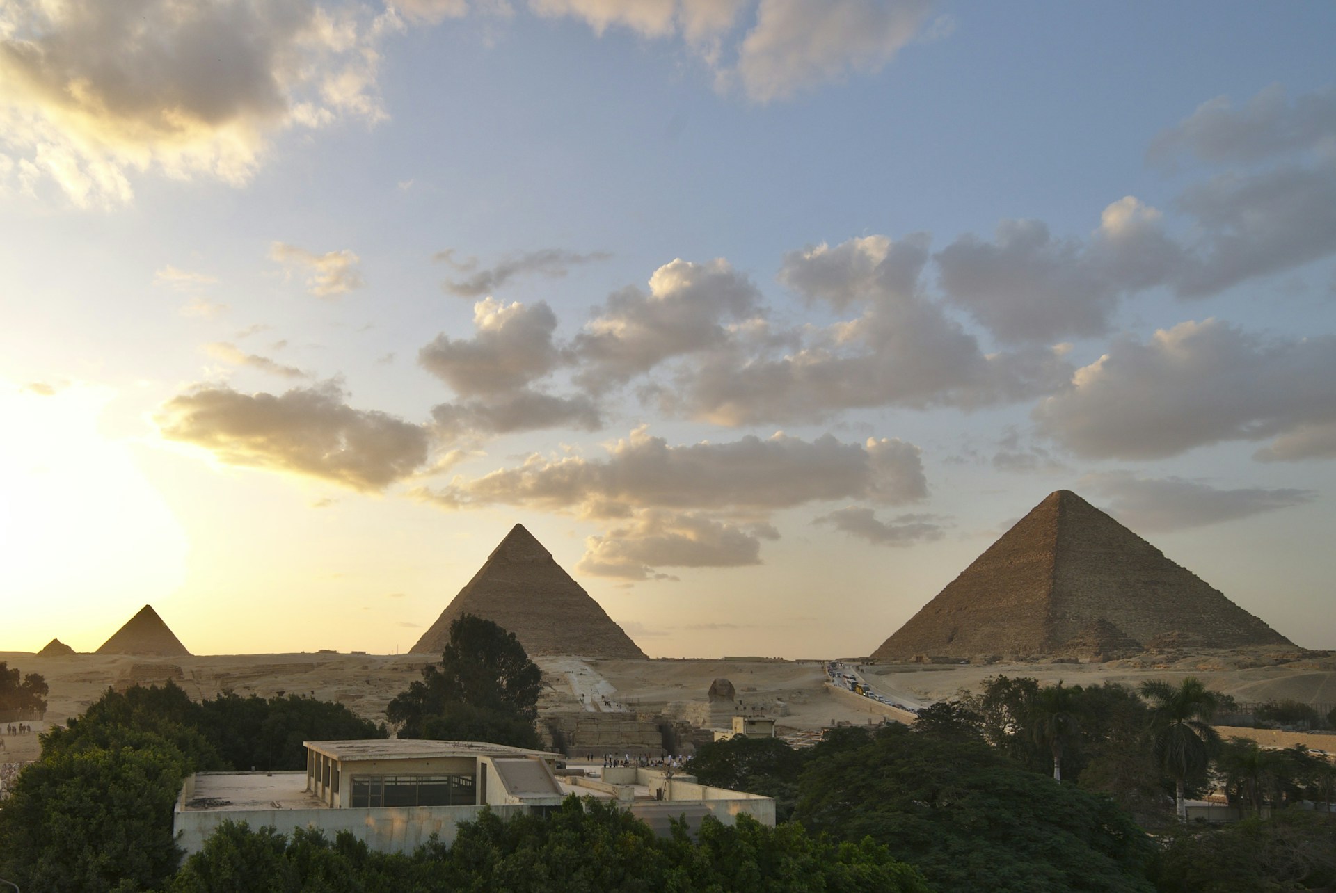A sunset view of the pyramids of giza