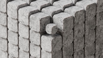 A group of blocks of cement stacked together