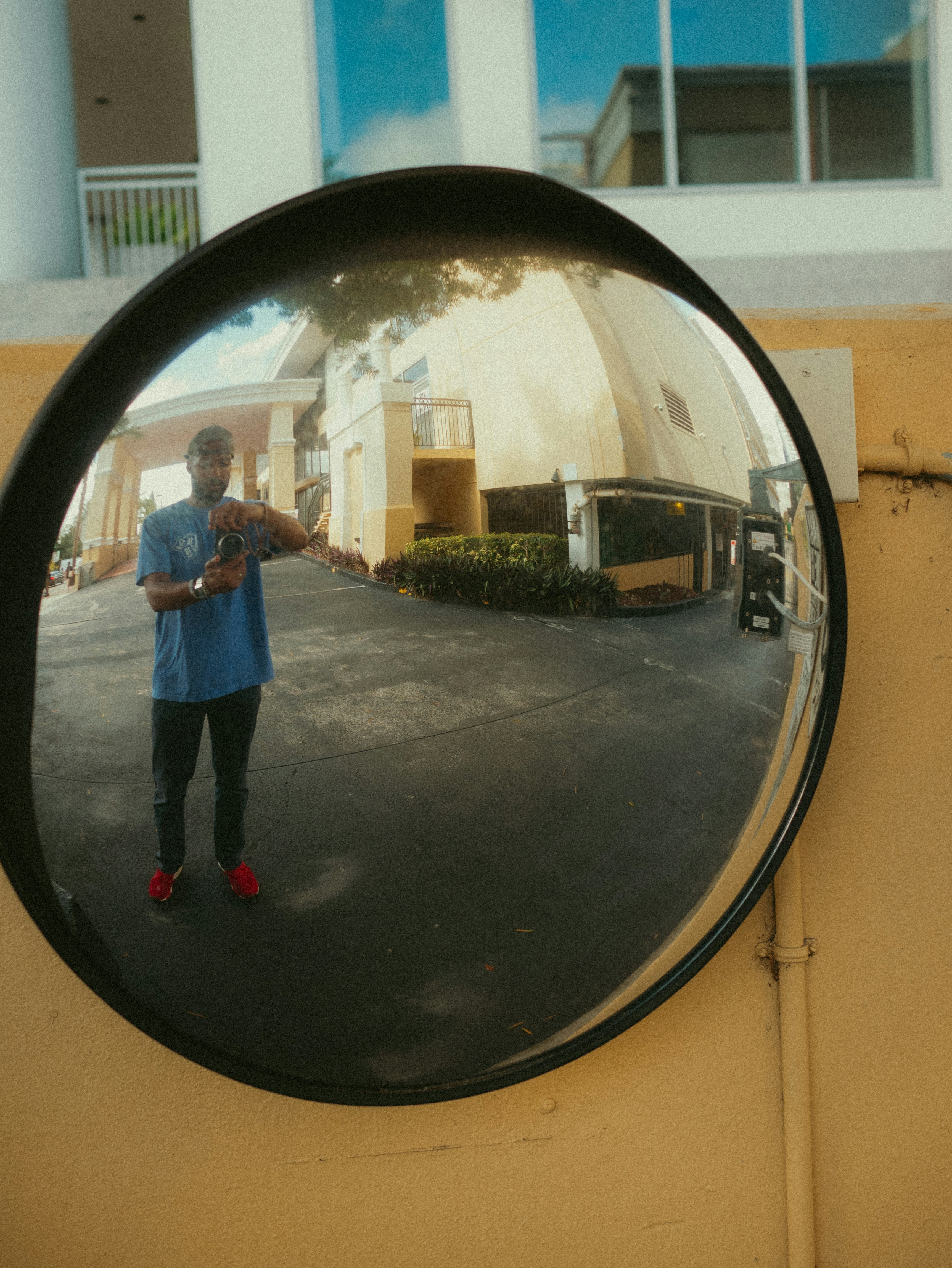 A man taking a picture of himself in a mirror