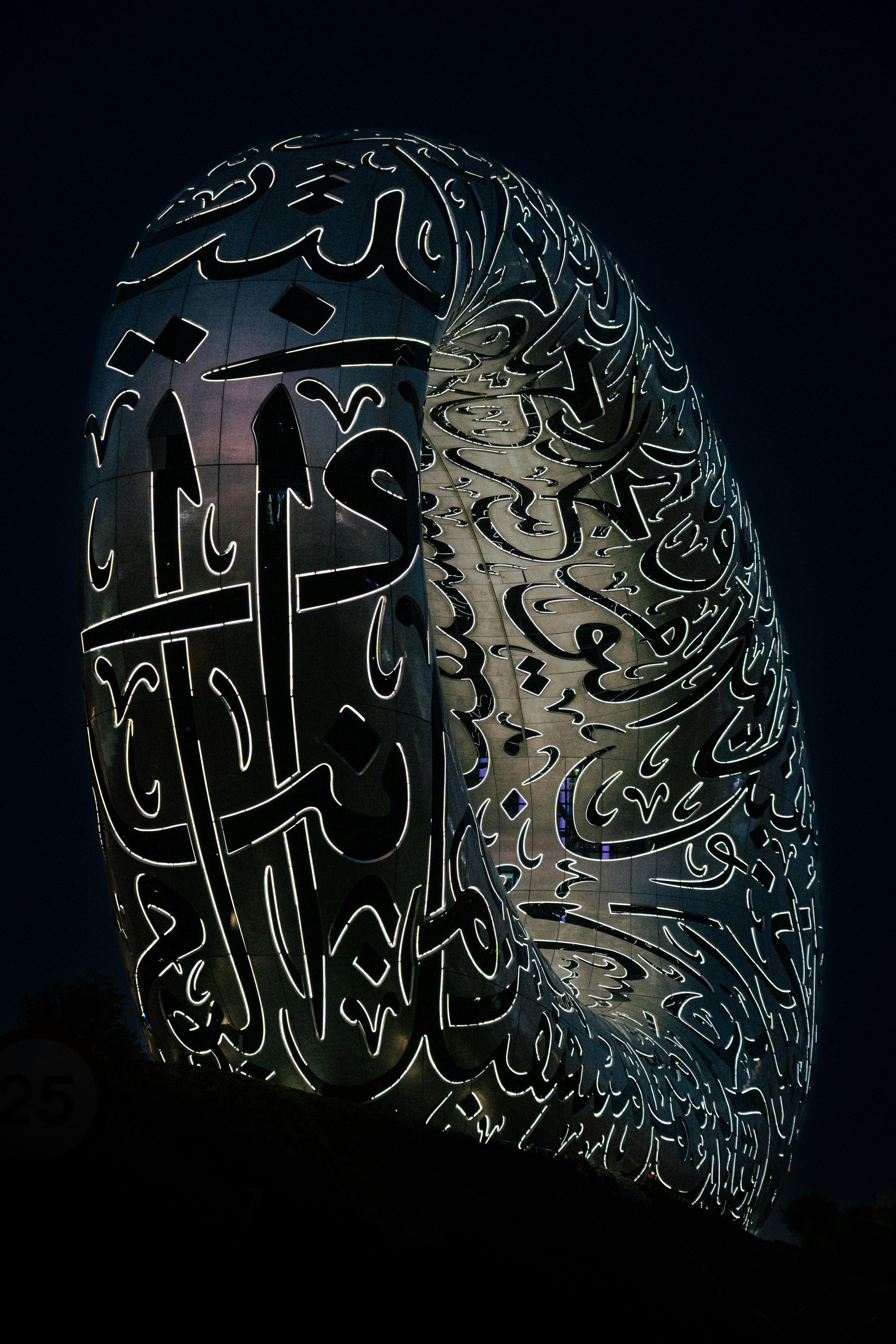 Museum of the Future iconic torus-shaped building with Arabic calligraphy at sunset