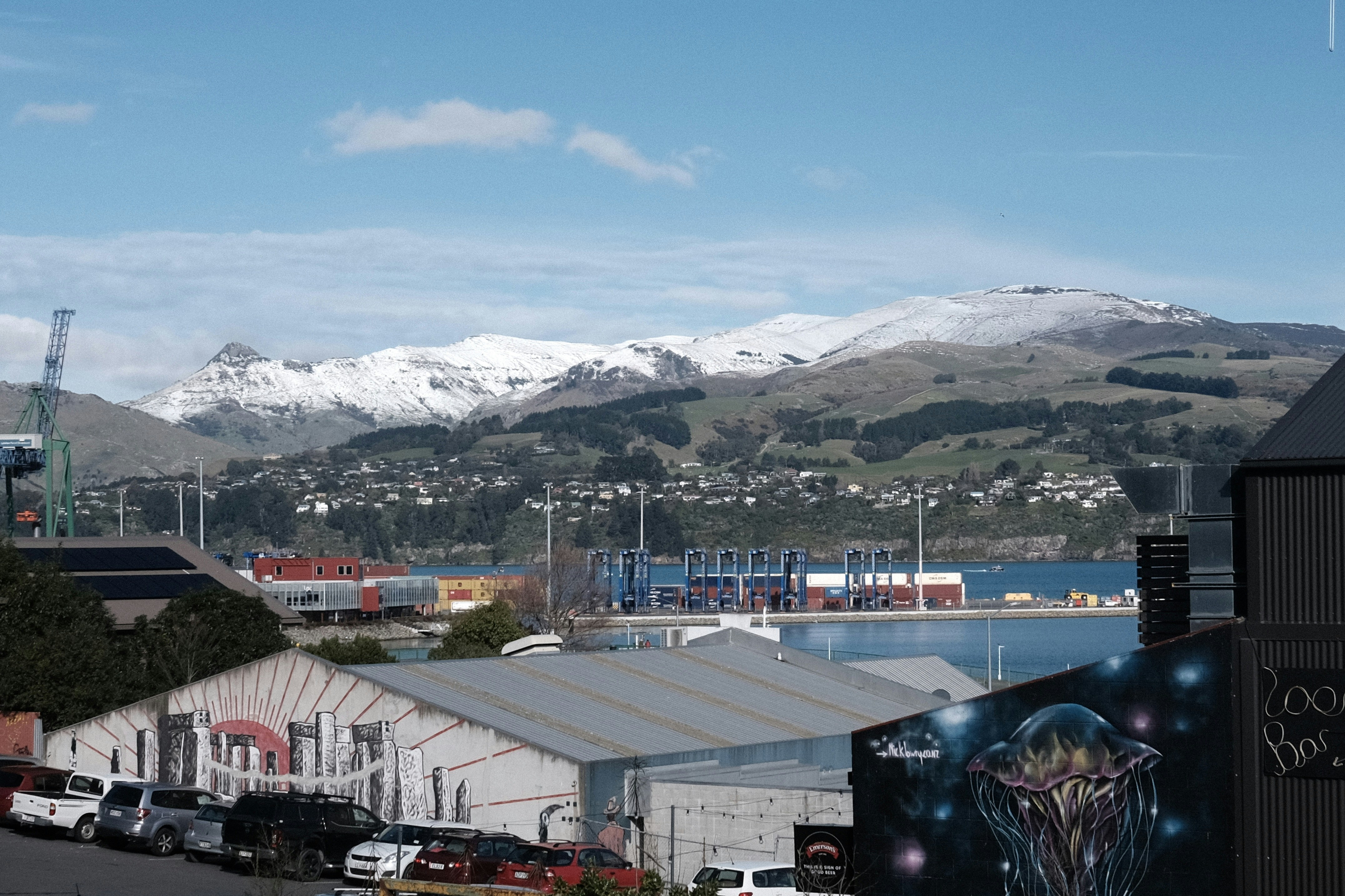 A view of a city with mountains in the background