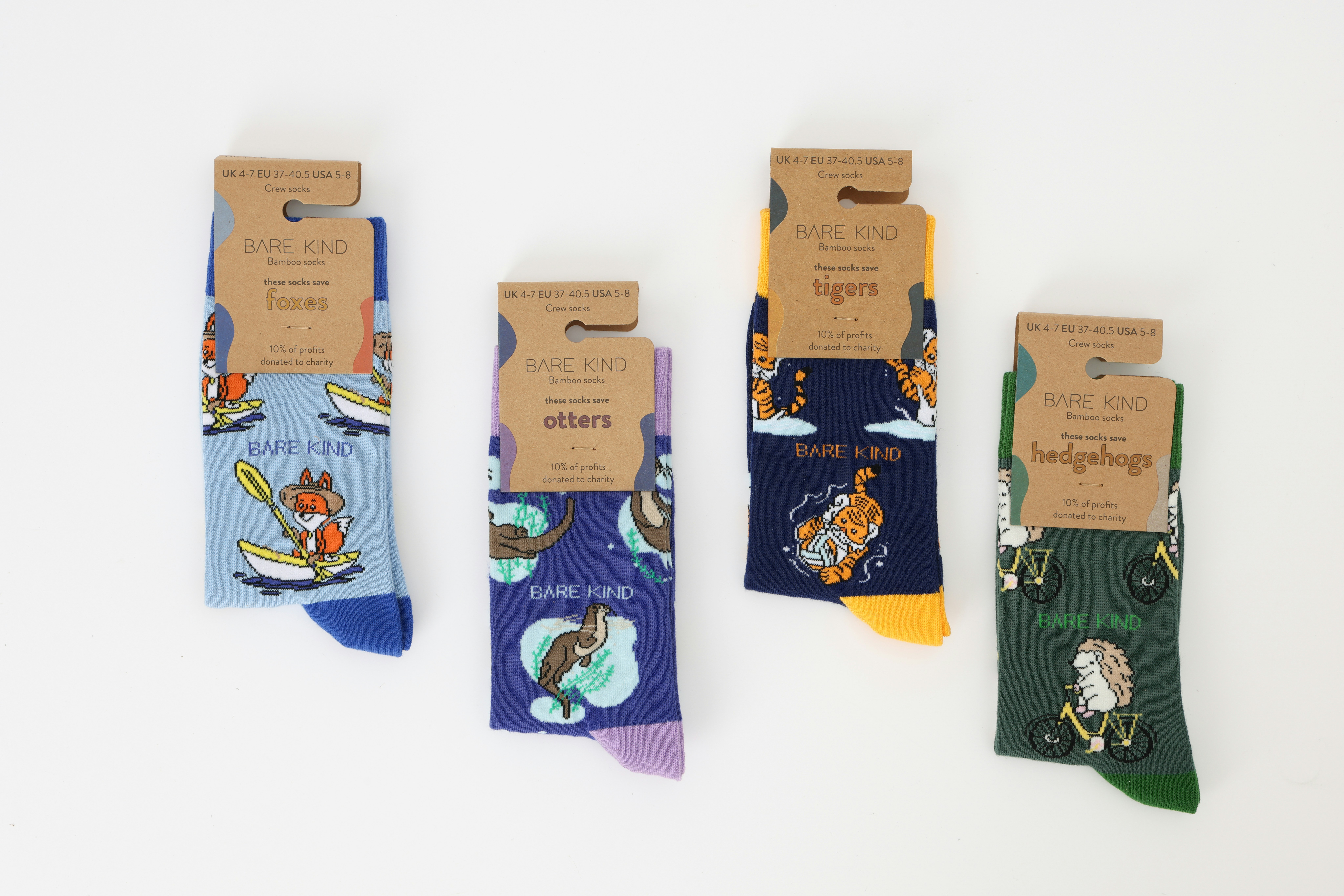 Five pairs of children's socks with cartoon characters on them