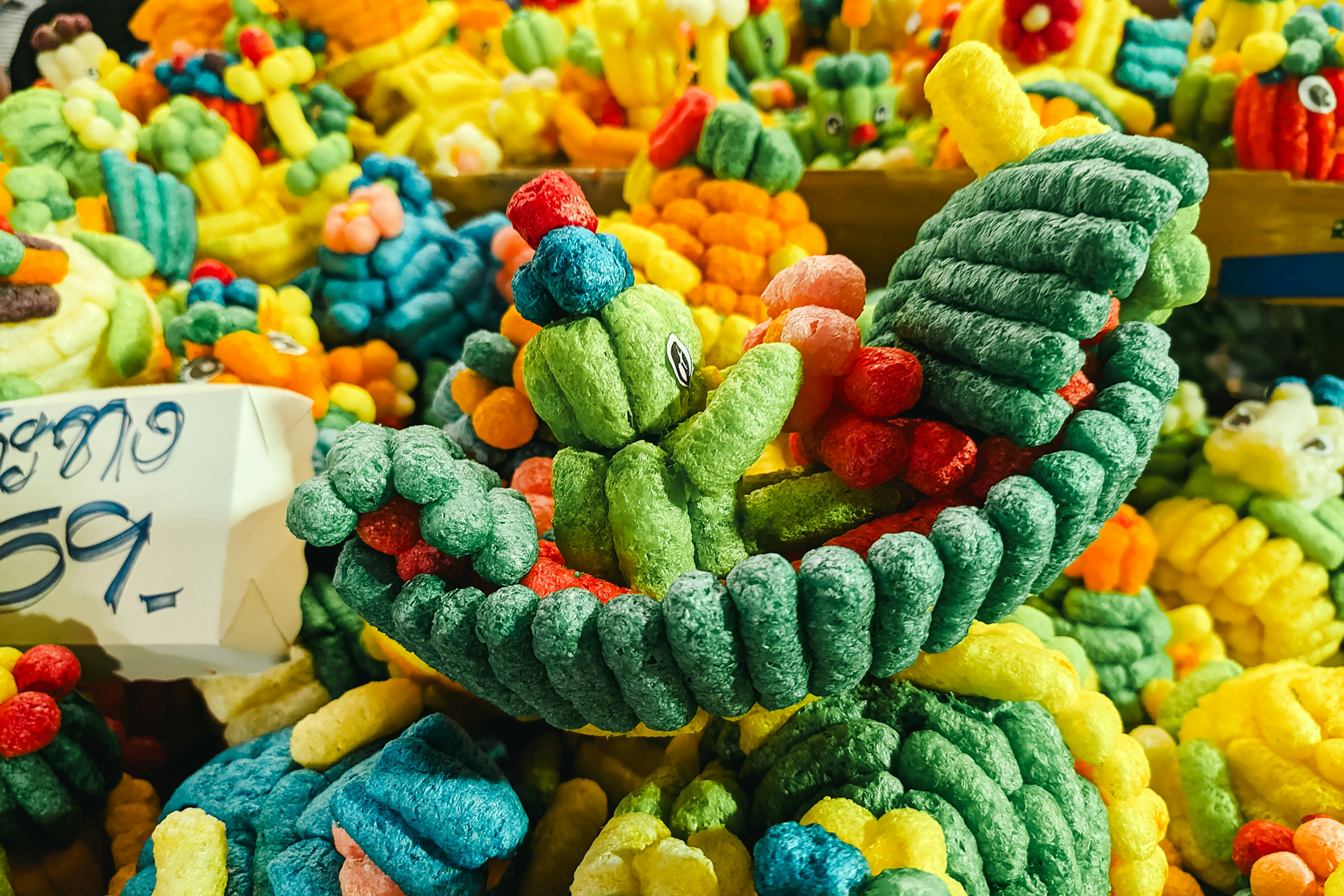 A large pile of colorfully colored candies for sale